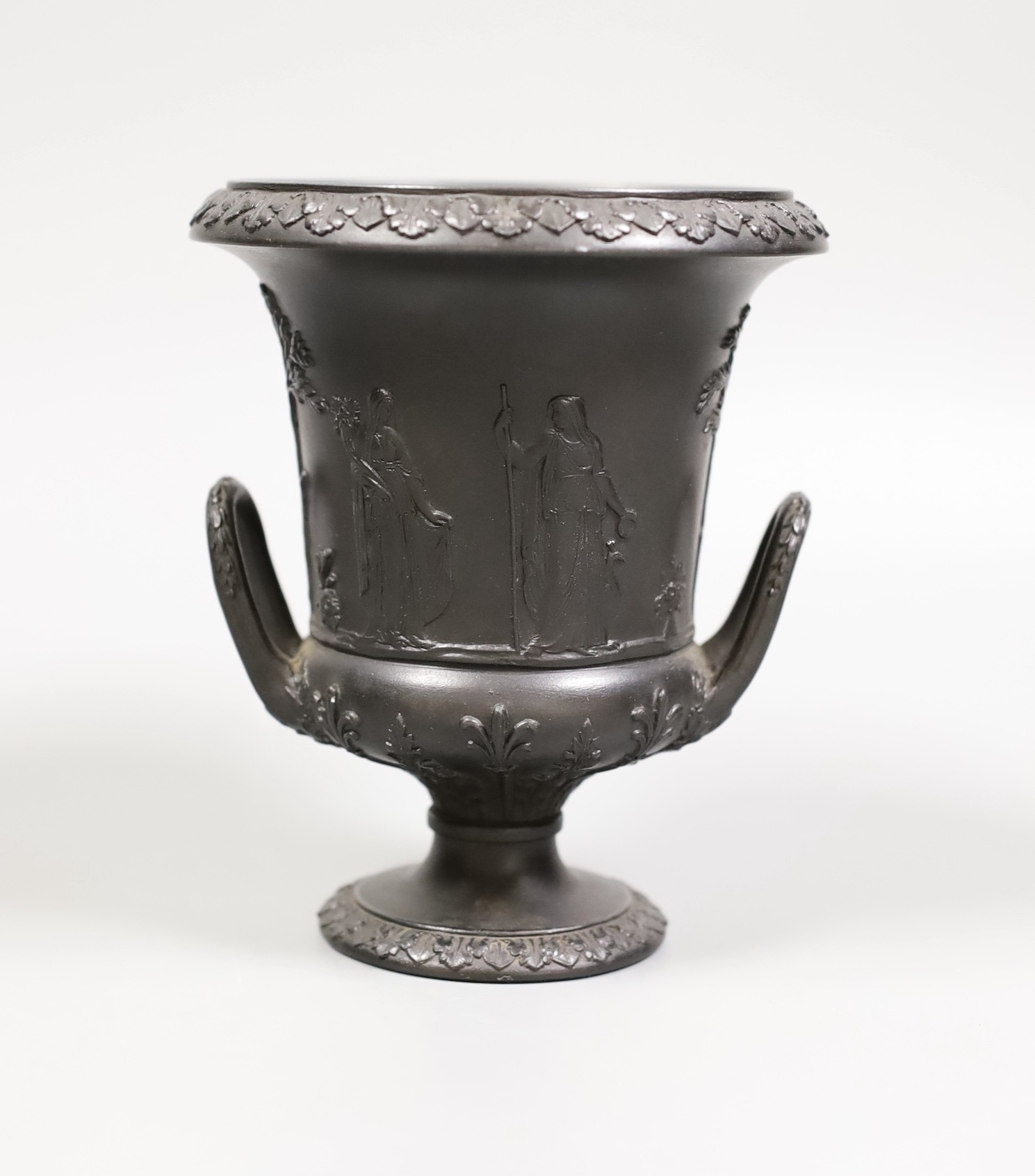 A Wedgwood black basalt urn vase, 13cm tall